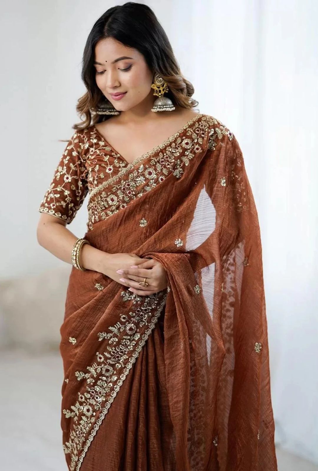 Unique Brown fendy chiffon silk sarees
